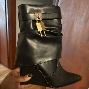 Elegant Black Ankle Boots with Gold Lock Detail